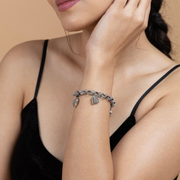 Sterling Silver Charm Bracelet with Heart Pendants