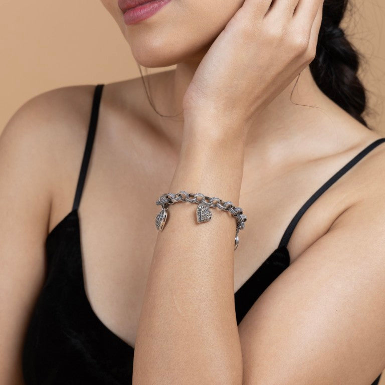 Sterling Silver Charm Bracelet with Heart Pendants